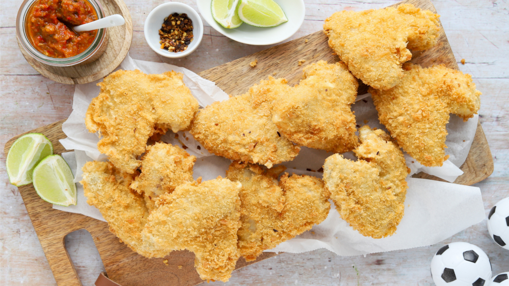 Chicken Wings in Bierpanade sind die perfekte kulinarische Stärkung vor dem Spiel und die beste Nervennahrung während der Halbzeitpause. Foto: DJD/wwwdeutsches-geflügelde